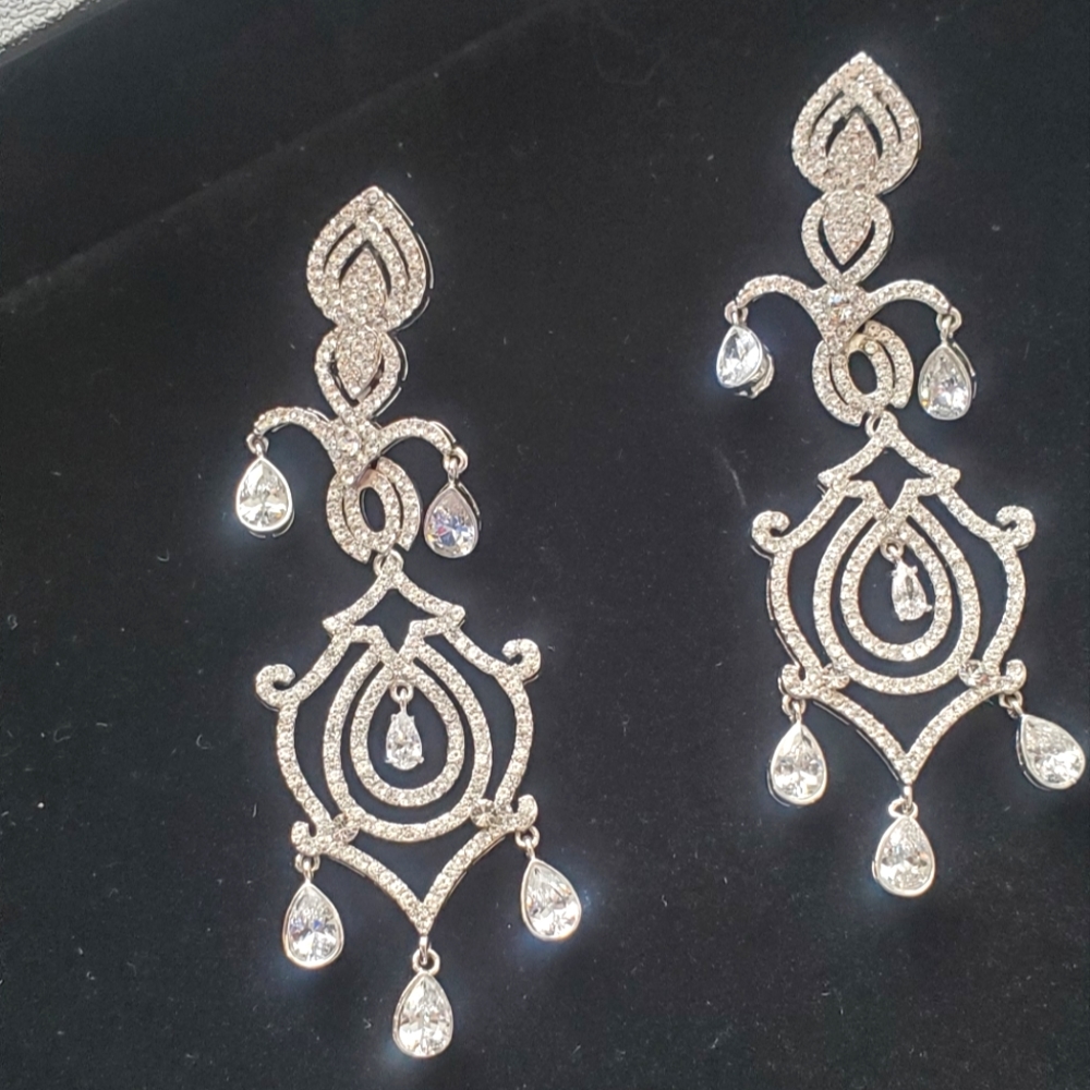 Rhinestone chandelier glamorous earrings. Almost 3" long. Never worn.